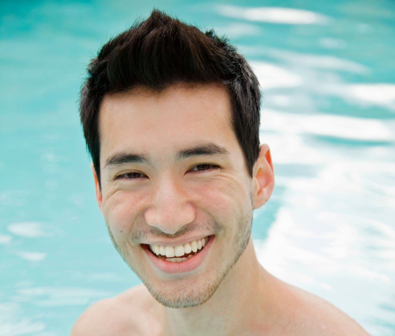 Man in pool with natural hair